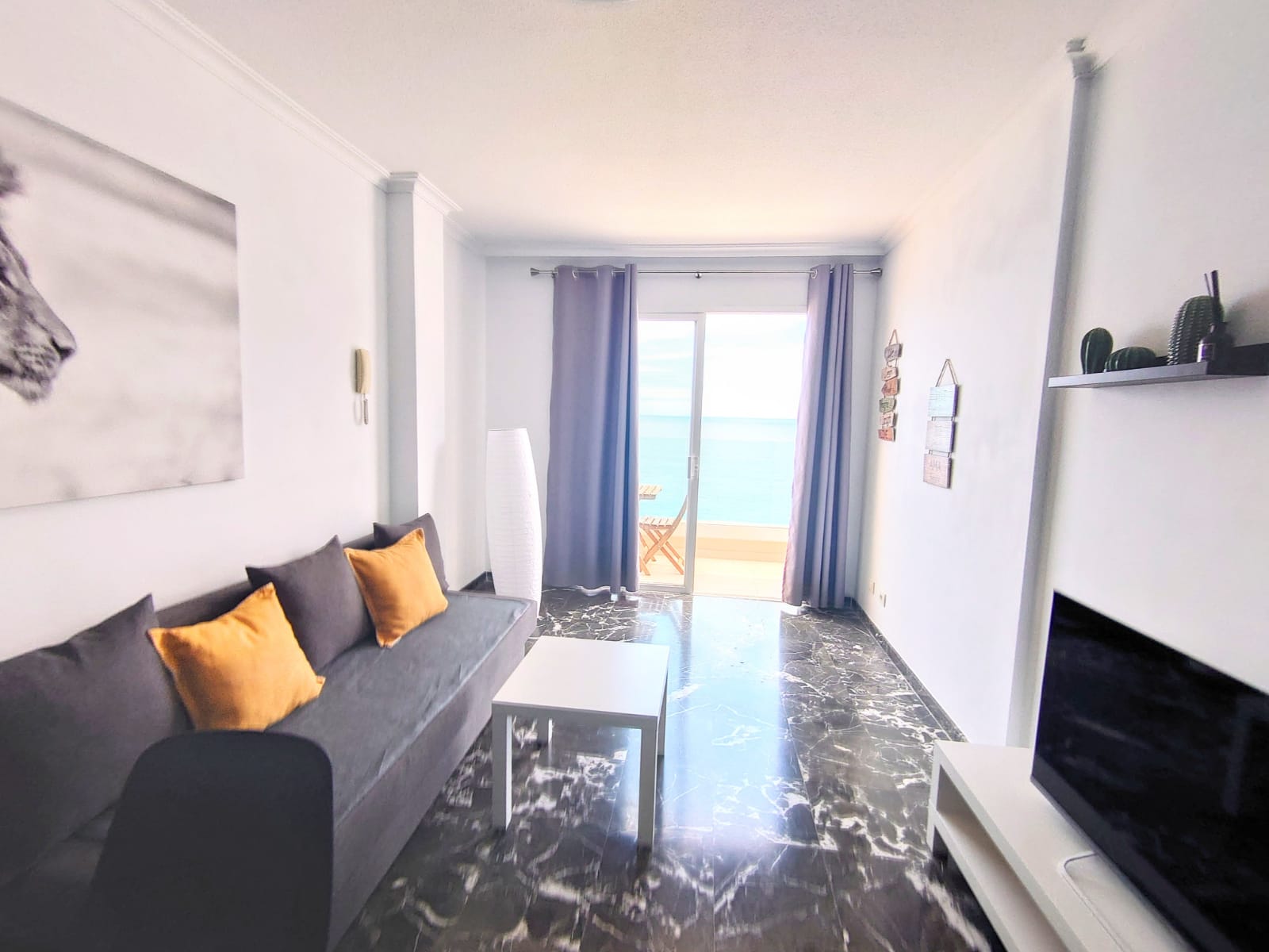 Living room of the bright house in Los Gigantes, Buenavista The Blue Oyster.