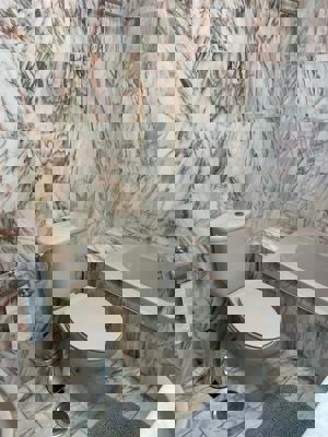 Toilet and bin in the bathroom of Buenavista The Blue Oyster, Los Gigantes.