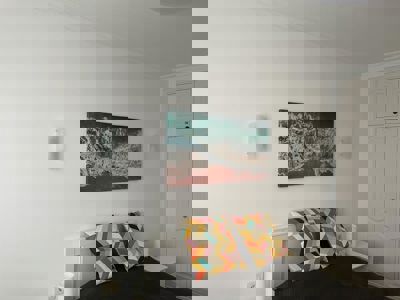 Decorated wall in the bedroom of Buenavista The Blue Oyster in Los Gigantes.