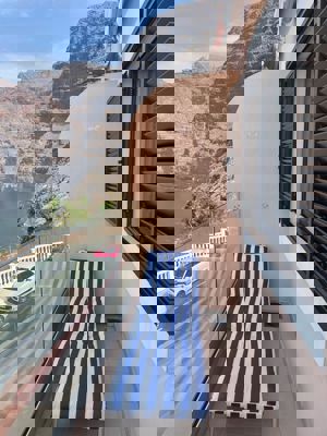 Lounge chair on the terrace of Buenavista The Blue Oyster in Los Gigantes, perfect for relaxation.