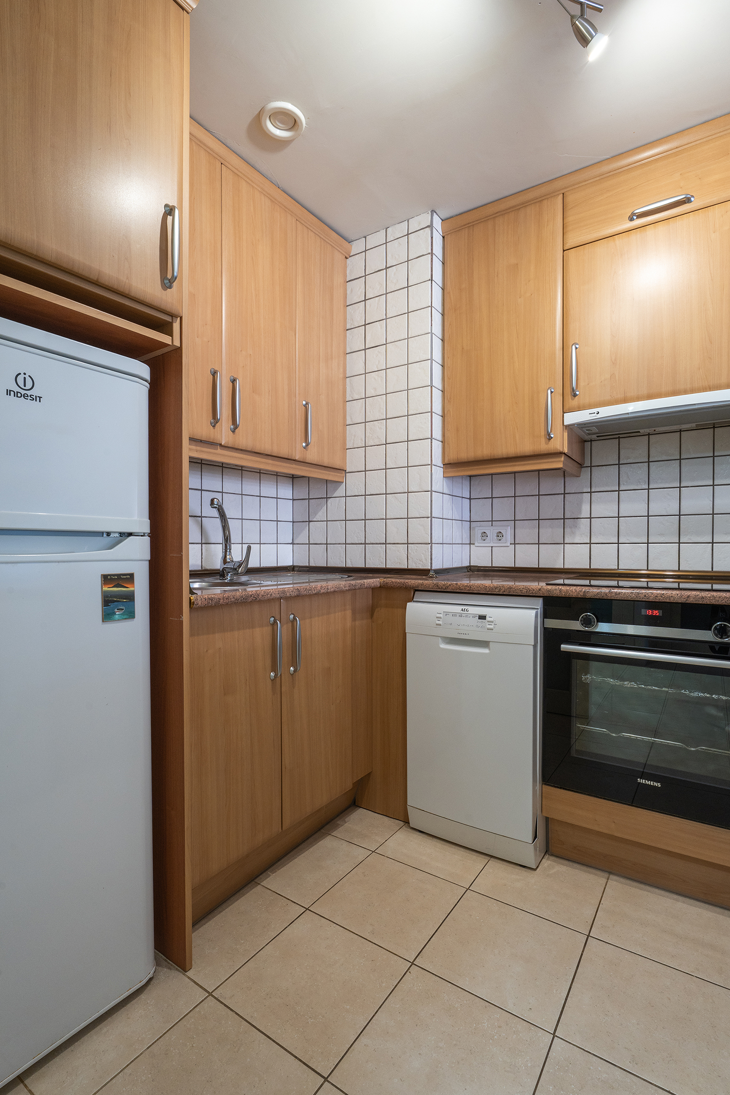 Modern dishwasher oven in the kitchen of Teide View Balcones de Los Gigantes.