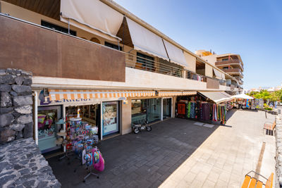 Beach items like umbrellas and towels in Vecindario.