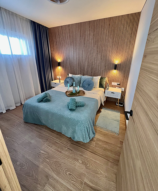 Bedroom in Callao Ocean View Luxury Apartment, stylish interior for comfortable rest.