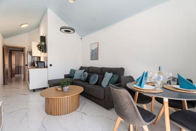 Modern living room in Amarilla Golf with a lounge area and access to the terrace.