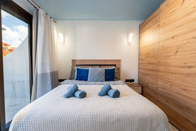 Comfortable bedroom in Amarilla Golf with carefully prepared bedding and quiet atmosphere.