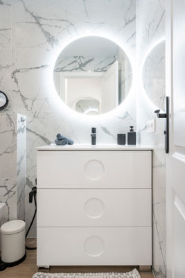 Spacious bathroom featuring natural light, modern sink, and shower in La Vista del Mar apartment, Canary Islands