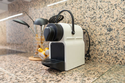 Modern kitchen featuring an espresso machine and appliances in a vacation rental in the Canary Islands, Golf del Sur