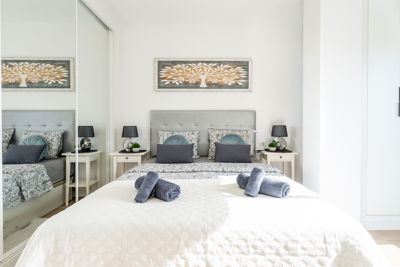 Cozy room featuring a double bed and modern decor in a vacation rental in the Canary Islands, Golf del Sur.