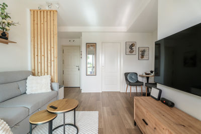 Spacious living room with large windows providing natural light in a luxury apartment in the Canary Islands, Spain.