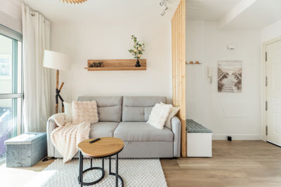 Spacious living room featuring a modern sofa and stylish decor in the vacation rental in Canary Islands, Spain