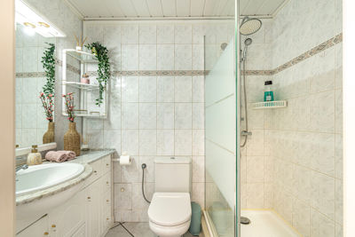 Modern bathroom featuring shower and sink in the Sol del Sur Ocean View vacation rental, located in the Canary Islands, Spain.