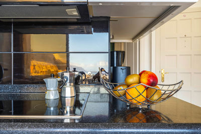 Modern kitchen featuring an Italian coffee maker and utensils in a vacation rental in the Canary Islands.