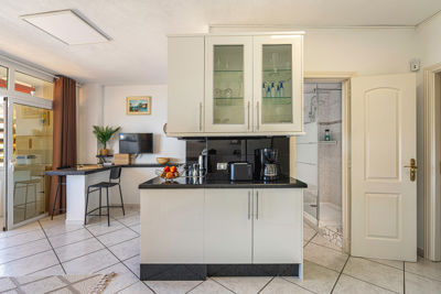 Modern kitchen featuring ample counter space and ocean views in a vacation rental in the Canary Islands