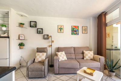 Welcoming living room featuring comfortable sofas and modern decor in the vacation rental Sol del Sur Ocean View, Canary Islands