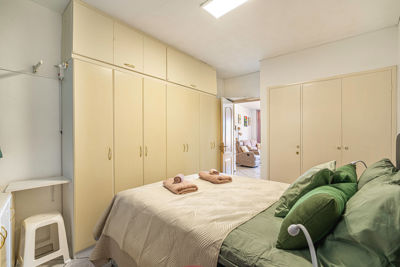 Cozy furnished room with modern decor and ocean views in a holiday rental apartment in the Canary Islands.