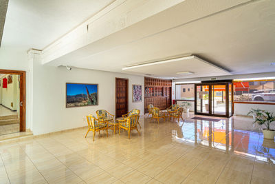 Spacious entrance with modern decor and natural light in vacation rental apartment in Canary Islands, Spain