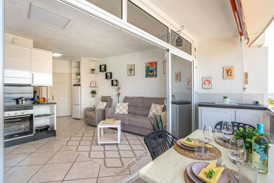 Cozy terrace with outdoor furniture and plants, perfect for relaxation at Sol del Sur Ocean View in the Canary Islands.