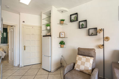 Spacious living room with bright windows and modern decor, in accessible apartment in the Canary Islands, Spain