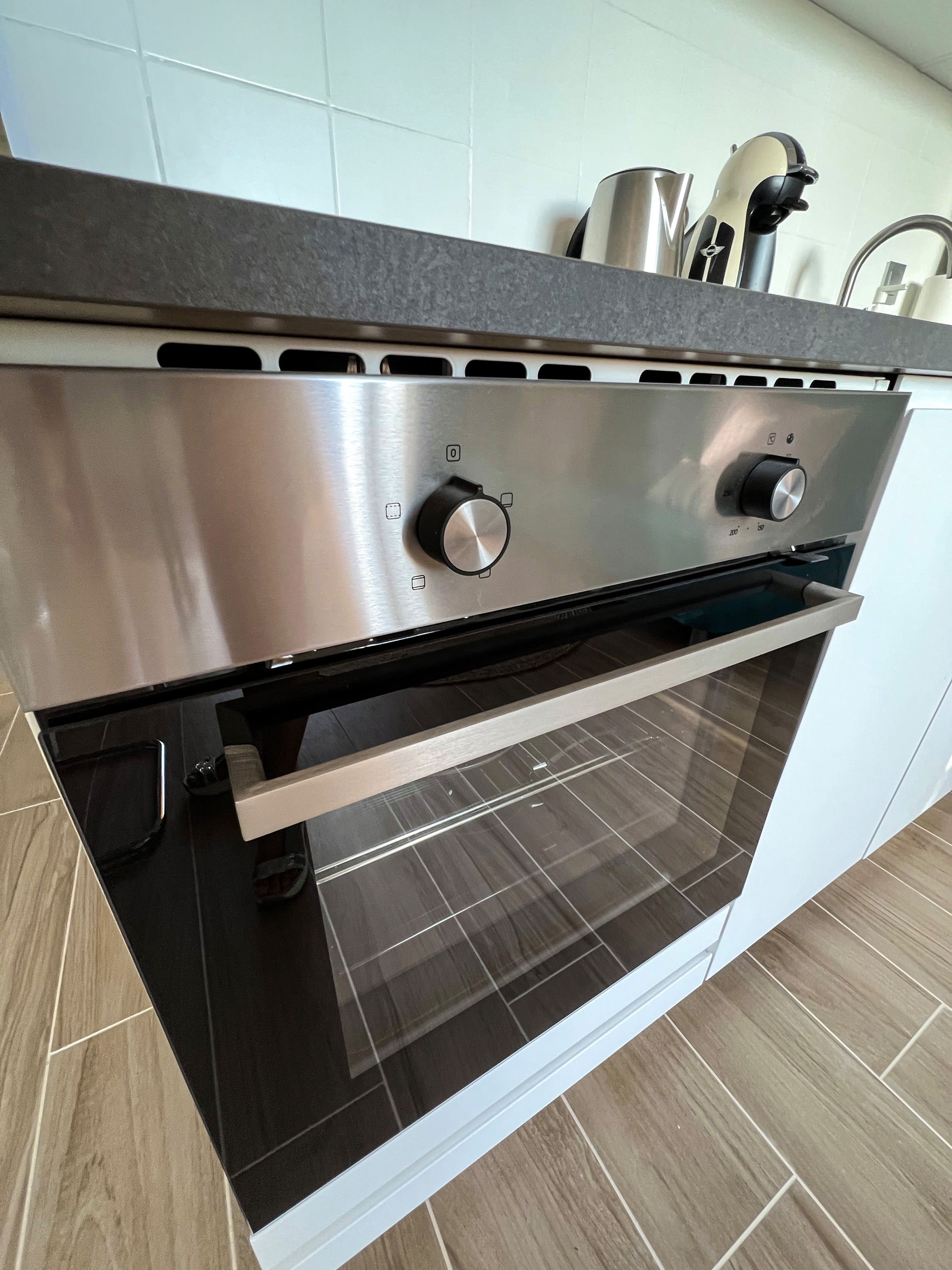Modern kitchen oven in the Orlando Sea View property in Costa Adeje.