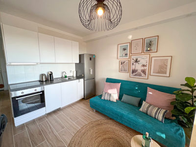 View of the spacious kitchen living room at Orlando Sea View in Costa Adeje.