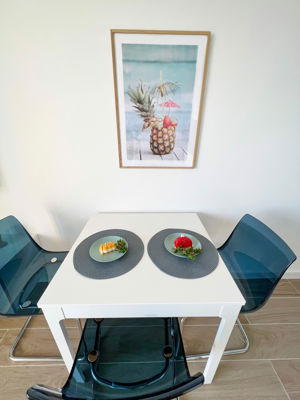 Table with a good breakfast in the living room of Orlando Sea View, Costa Adeje.