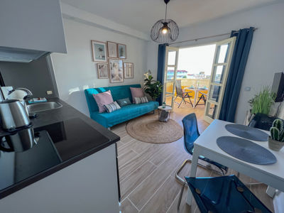 Living room of the open house at Orlando Sea View, Costa Adeje, featuring modern decor and sea views.